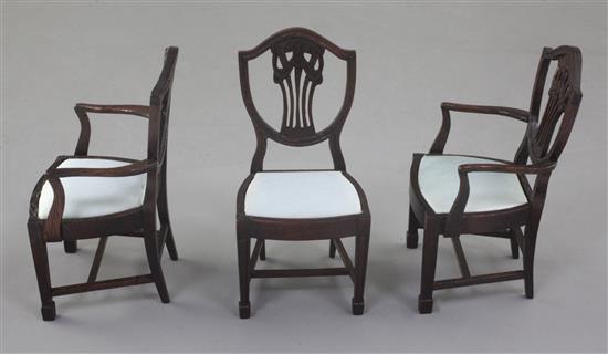Denis Hillman. Three Hepplewhite style mahogany shield back miniature dining chairs, height 3.5in.